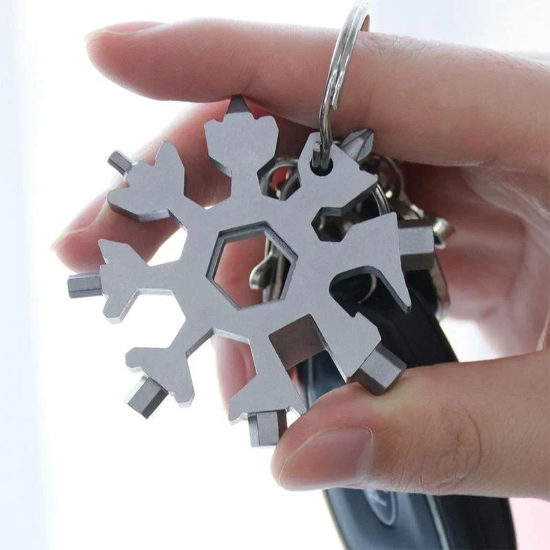 Snefnugformet multiværktøj med 18 funktioner