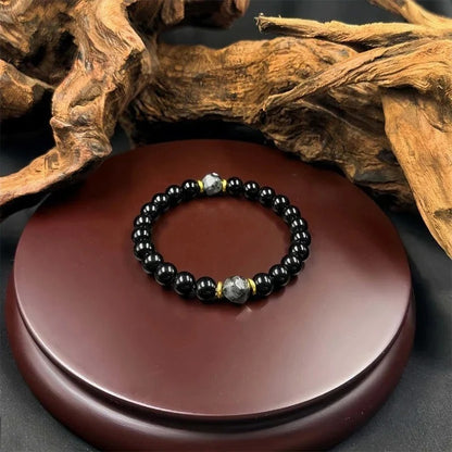 Beskyttende armbånd med obsidian og turmalin